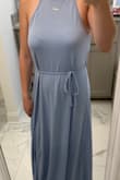 I wanted this dress for my engagement photo session, but I returned it. I felt as if I threw a sheet over my body and tied it up with a string. Maybe if I was a little taller you could see more of the slit, but overall not a great fit. - Caroline H.
