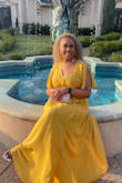 I purchased this dress for a wedding, and it was perfect. The material was super soft and cool for the hot Texas weather. The only negative thing is that the dress was very long even with heels. I got so many compliments that I'm considering getting this dress in another color. - DeeDee P.