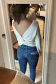 I LOVE this sweater. The material is great, and the back is so cute. I can't wait to wear this in fall.
As a petite girl, the only downside is that the sleeves are really long on me, but I'm still keeping it. - Lindsay D.