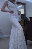 I love this dress! Beautiful and flattering. It is a little big on me, but I think an XS would be to tight ( they need to make an xs 1/2 LOL) but over all it is a really gorgeous dress! Can't wait to wear it for my wedding - Cienna G.