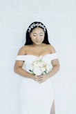 At first, I thought this dress wouldn't work because I struggled with the shoulders (I have broad shoulders) but it turned out fine. I felt so beautiful on my special day! For anyone considering this as an option dress put go ahead and purchase. - Linda D.