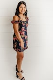 Absolutely love this dress! It is a little short and a little tight but it worked out for me. I ordered an L, I tend to like to have a little extra room in my clothing so it's all about what you prefer. Great for pictures or a date night! - Savannnah B.