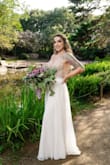Ordered This Dress For Our Elopement And So Glad I Did! Simple, With Just Enough WOW In The Beading Details. I Am Usually A Size 6, But With It A Tad Bit Snug, Just Where It Clasp Up Top, When I Sat Down, I Decided To Exchange And Size Up For An 8. Got Alterations Where Needed, And It Fit Like A Glove. - Sarah D.