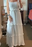 The PERFECT summer dress. I have recently got engaged and I just wore this to dinner with my bridesmaids. I think it the fit is perfect and it came to about my ankles! I included a picture for better reference. - Haley Q.
