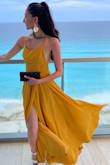 Amazing color and material! Was a perfect fit. I did use a safety pin as the slit was too high but I knew that before purchasing as all the other reviews had mentioned it. It's such a good quality dress! - Praj J.
