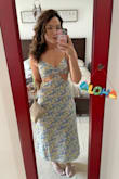 I am a curvy girl with a small top and fluctuate between a small and a medium in Lulus dresses. Ordered both and went with the medium on this one for a better fit. Love a good midi and the cutouts add just the right amount of sexy. So many compliments everytime!!! Looks just as pictured. - Megan F.