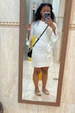 Dress runs a little wide in the stomach. It's not supposed to be a bodycon dress so that's as expected. Very nice dress and appropriate for special occasion events. I usually order a medium in dresses but I got a small in this and it fit well. - Kamara N.