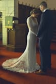 Very elegant dress. I had so many compliments on the details and how well it fit my body. I had it taken in a little in the bust, waist, and hips. Definitely would recommend staying to your size and getting it altered. - Christal W.