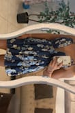 The dress is really nice, material is thick, the dress is a little short but really depends on your height. You can dress this down or pair it with some heels. - Sasha G.