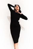 Tight on arms but not too much. Good material and zipper. Super elegant. Instagram @roseguingrich for more clothing inspiration & reviews. - Rose G.