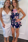 I wore this for my sisters bridal shower and loved it! It is nice and flowy and breathable without making you lose your shape. I'm only 5'4" and it was a bit short so you may need to size up if you are taller. A little hard to get the wrinkles out but worth it! - Gina D.