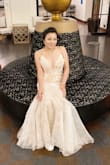 I love the lace on the dress. I actually bought it to wear for our 10th anniversary photoshoot. It fits me well. I don't need to alter it at all. Good quality for the price. - Melody N.