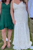I work this dress for my marriage celebration! It was perfect. I love the way it hugged my body and was comfortable. I did get it hemmed in the front. I probably would've bustled it the back so I could dance more freely since the train does drag but I loved it! - Samantha K.