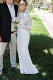 I ordered the XXS upon reading reviews that the dress is stretchy. I'm also quite short, so I thought the dress length would be perfect with high heels, and it was! It was everything I ever wanted. Probably best for a smaller wedding because it is a simple dress, but if you combine it with a nice veil, you can have a totally different look! - Asri N.