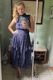 Very beautiful dress. I wore it to a friend's wedding in July and I just wanted to fall asleep in it - so comfy. Also fun to dance in - no sleeves, no sweat problem ;). The fabric has a weight to it, but it's breathable. It feels substantially made. The ruffles and cinched neckline + waistline give this dress a lovely silhouette.
I think a bustier girl than myself would fill out the top a bit more; I had some room to work with, but it wasn't noticeable. - Hannah M.