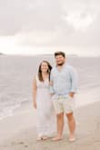 This dress was just what I was looking for for our beach engagement photos! It flowed beautifully in the wind. If I wore it out, I would definitely have to wear a heel and the top button was struggling a bit to keep the girls in but it doesn't feel tight around the chest area. - Madison P.