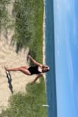 Medium fit like a glove! Not too much side boob and low back like I wanted. Shows the perfect amount of my bum too. Been looking for months for a simple black one piece swimsuit and so happy I found this one! - Angela D.