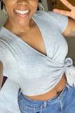 It's shorter than my average crops but pairs well with my highest waist jeans! I dressed it down with jean shorts but it can be dressed up, too! The fabric is soft with a light stretch. Highly recommend (but only at the sale price!) - Trinity P.