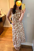I loved wearing this dress for a wedding and it looks just like the picture. Taped my boobs with some KT tape and I was good to go. Love the length and the halter, although it was a tad generous for me. It's also fully lined. This dress will work for any function, the color combo is unique and the print is pretty. - Whitney M.