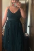 I originally ordered this dress in an XL as I usually go for a 12-14 in dresses.  It fit fine but was just a little too loose for my liking. I decided to go for the Large and it was PERFECT. I wore it to a wedding and got tons of compliments. We went to a bar afterwards and a girl stopped me to tell me "you look stunning". I love this dress! I am so mad at myself because I forgot to take pictures in it. I need to find an excuse to wear it again! - Alison T.