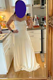 I loved the skirt on this dress! As you can see, I would certainly need it hemmed (I am in 2" shoes in this photo). The bodice looks a little cheap (too shiny maybe?), but I think it would still make a fun party dress, or after wedding dance dress. Ultimately decided to return it. - Quinn S.