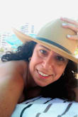 Love the durability of this hat.  It did not flop and it held upright very well and sturdy. Just the size I was looking for coverage. - Elizabeth Z.