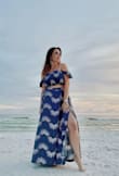 This outfit was beautiful and perfect for photos at the beach! The top stretched to fit and still looked nice so that was a huge plus for me (I'm actually a 32G, but that wasn't an option in the basic fit details). The bottom was about 6 inches too long, so I did have to hem it in order to wear it without giant heels. - Gaby C.