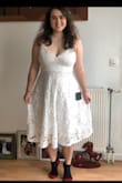 Love this dress! All the reviews said to size down and so I did, my measurements on the chart were probably closer to a large but I got a medium and it fits perfectly. My only complaint is the length - pictured it hitting just below knee but for a short person like myself it's more shin length. Not the most flattering but I'll just wear heels and hope for the best. Plan to wear this for my civil ceremony and probably rehearsal dinner! Lace is cute and quality is very good. - Emily S.