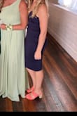 I got this dress for wedding season and it did not disappoint! It was the perfect length and the material is stretchy enough to still dance and have a good time in. It's also thick enough that I wore shape wear under and it still didn't show. My only cons are that the navy is very dark and the straps don't adjust but it didn't bother me much. It's just fancy enough. - Jessica H.