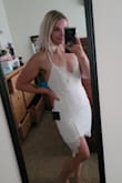 Bought this dress for my upcoming Bachelorette party. I wanted something both pretty to go out to dinner in, and sexy to dance in. And this does not disappoint! It is a little loose in the chest, but I have almost no bust so it was to be expected, buying dresses is hard for my body type. It fits nicely on my hips and butt. - Nicole W.