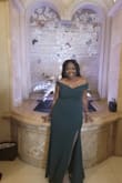 I absolutely loved this dress. Dress is comfortable and perfect to wear to a formal event. It hugged my curves just right and the slit wasn't too high. Usually I avoid off shoulder stuff but it remained in place the entire night! - Meikisha D.
