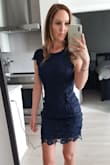 I originally bought this dress in white lace for my engagement party and loved it so much I bought it again in the navy blue so I can wear it for other occasions. It fits amazing and the lace is so beautiful. - Anita I.