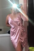 Super cute comfortable dress. If you're in between a medium and large order a large. The only problem is the cross in the middle does rise a little high but nothing some dress tape can't fix. A little dark pinker than advertised but still cute. Love this dress! - Emily N.