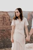 This dress was so stunning and made me feel so beautiful. It fit perfectly everywhere  except the bust was a tad big. I think this is just because im smaller chested as is, but i pinned it and im still so in love. So worth it, and the engagement pictures turned out so so well. Get the dress! - Mckenna W.