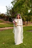 It's a very beautiful dress for an affordable price. I just had a small wedding ceremony with both mine & my husband's family so this dress was perfect for the venue. The dress fit my body perfectly! Nobody believed it cost me $80. I paired it with a long veil and it just all came together perfectly! It was a little too long only because I wasn't wearing heels, so I got it altered (: it's a beautiful dress! - Kathleen