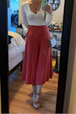 Looooove these beautiful pink pants! Being pear-shaped I thought they might be too widening on the hips, but that isn't the case since the high-rise draws the eye to your waist. Because of the high waist they pair really well with a form-fitting bodysuit. They're made of a nice, thick fabric and seem like they'll hold up a good long while. Highly recommend! - Joy M.