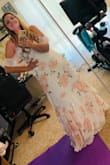 I'm just in love with this dress! I got it for a engagement photoshoot that I'm about to do in California, and OMG. I normally buy dresses M or L, so I wouldn't say that it runs smaller. I got the Large this time and it is just perfect! you don't need to ware a bra which is perfect, and it covers my arms a little and I love it, because I hate my arms! It's just a little big on my chest but you can even notice to be honest! I can't wait to get more dresses from this store. I paid for shipping so it arrived suuuuper fast and it was not expensive at all! - Ludmilla V.