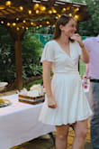 This dress was perfect for my summer rehearsal dinner! It is so light and breezy, which makes it super comfortable, but it is not see through at all (which is difficult to find in white)! I usually have a hard time finding cute mini dresses like this that aren't too short as I am 5' 8", but this one is just the perfect length! - Leah L.