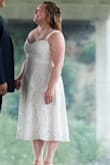 I wore this dress for my outside wedding in high temps (106 F) and I loved it so much! It is great quality and a nice weight. I originally bought a L but returned it for an XL. I had it altered to take the bust in slightly and the straps shortened. I felt so comfortable in this dress and it looked so great! The price was great too! It felt slightly formal and I loved that too :) - Claire U.