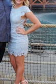 Love this dress! I wore it to a friend's wedding in Vegas and got so many compliments. It was comfortable all night. I ordered a Large based on the measurements and it had a little bit of room. I only wish the dress had built in cups or some kind of support in the front since I couldn't wear a bra with it. - Lacey C.