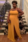 The dress fit perfectly. it was tight enough at the top to hold me up all night. I'm a 38H and I was very worried this wouldn't be able to handle me, but I was pleasantly surprised. Danced all night with no issues. And got lots of compliments. It is long, even with 5-inch heels, so if you're shorter you will need to get it hemmed. - Jordan V.