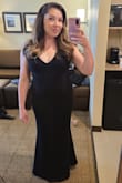 This is the most perfect dress. It's timeless, elegant and sexy. The best dress purchase I have ever made. It has some nice stretch to it and the fabric is thick. The mermaid bottom flows nicely and it's easy to walk in. I wore this for a formal wedding and it was the perfect pick. I did have the straps taken up a bit and had about 3 inches taken off the bottom by a seamstress. I wore 3.5 heels with it. Buy the dress! You won't regret it. - Teynan T.