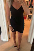 This dress is sexy and comfortable! It's a little tighter than I am used to for this size, but I wouldn't size up. Also I am 5'8 and it's a little short, but not too short. It's very stretchy and comfortable and flattering! Great for a night out! - Jessica M.