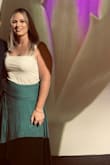 This skirt is gorgeous on! We went to the Van Gogh exhibit and my date kept complimenting through the evening. Unfortunately the wrinkles were a little hard to get out but the skirt is perfect for any nice evening out - Ashley H.