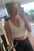 Obsessed with this tank! Great material, don't always wear a bra. Nice crop length and looks flattering on muscular body. - Madison M.