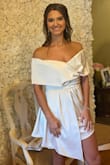 This gorgeous dress exceeded all of my expectations! I ordered it for my bridal shower hoping it would be exactly what I was looking for - and it was even more than that! My first impression when I took it out of the bag was the thick, high quality fabric. I'm truly so pleased with the material, style, and length. I received more compliments than I can count (even from the older ladies)! - Kaitlin M.