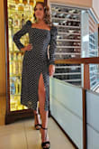 It is very beautiful and classy, loved the sleeves and the length.  It runs a little big in the waist so I ordered the xs and it was too small in the bust. If you are in between sizes order the larger one. - Barbra B.