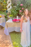 I bought this dress for my bridal shower in a garden and it was perfect! I was worried the dress wouldn't fit but the buying guide was pretty spot on. I felt pretty amazing in this dress! 

Being so short I'm used to hemming my dresses but I didn't have to, I just put on a pair of heels and it was perfectly right at the ground! - Sarah L.
