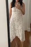 This is a very comfortable dress. You can easily dress this down with a jean jacket. I liked that it had adjustable straps and the fabric was good quality. I ordered a medium and think a small could have fit too (5'6/137lbs). It was slightly baggy around the waist but not a deal breaker! I recommend. Came very fast too. - Mary B.