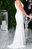 Planned a quick and private Covid wedding. This dress arrived on time and fit perfectly. I loved the small train. - Jennifer R.
